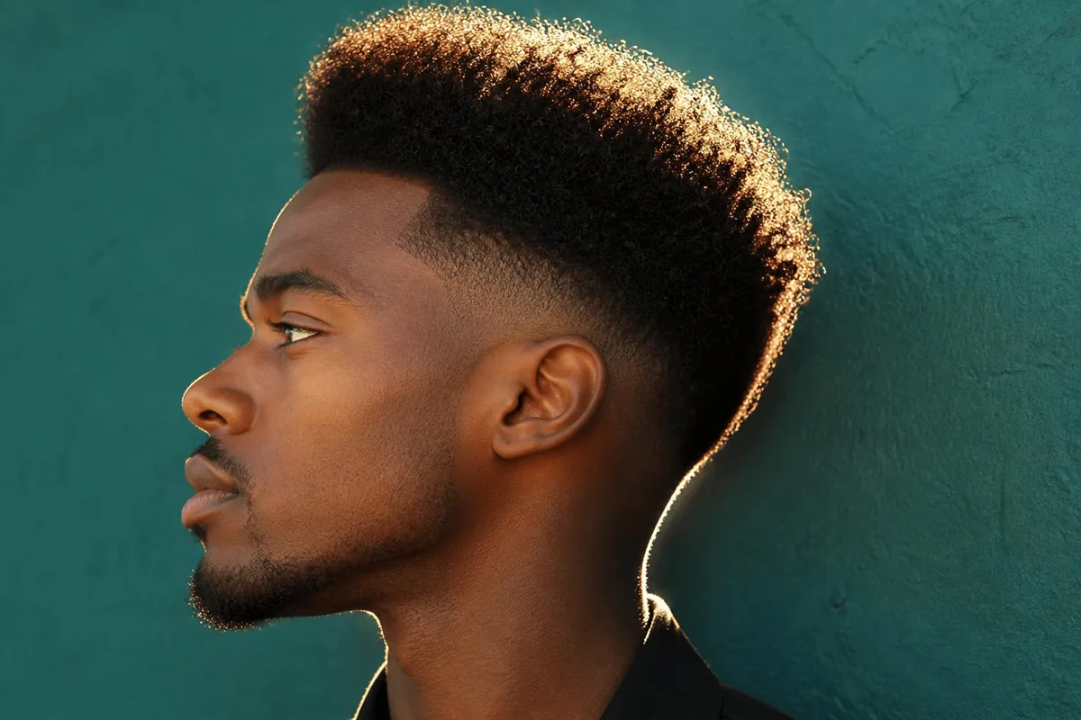 Drop fade black men high top afro side profile