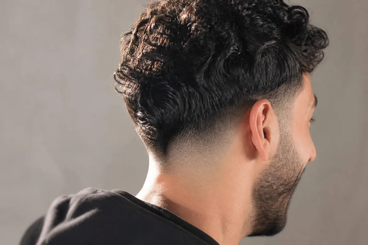 Drop fade neckline curly hair nape cowlick