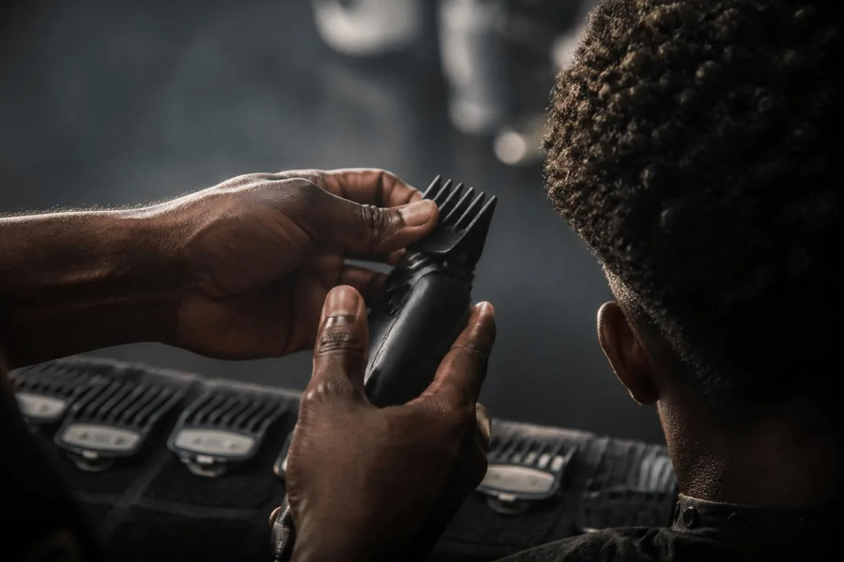 Low taper fade guard curly hair